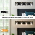 thumbnail image 2 of Fine Maker 4-Light Black and Gold Bathroom Wall Lights with Clear Glass Shades, 2 of 10