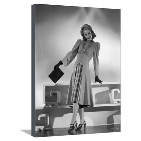 Standing Portrait - Barbara Stanwyck standing in Dress with Gloves and Heels Classic Portrait Stretched Canvas Print Wall Art By E Bachrach
