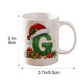 thumbnail image 2 of Christmas Alphabet Mug with Santa Hat - Ceramic Personalized A to Z Coffee Cup for Hot Cocoa Tea or Coffee, Festive Decor and Holiday Gift G, 2 of 6