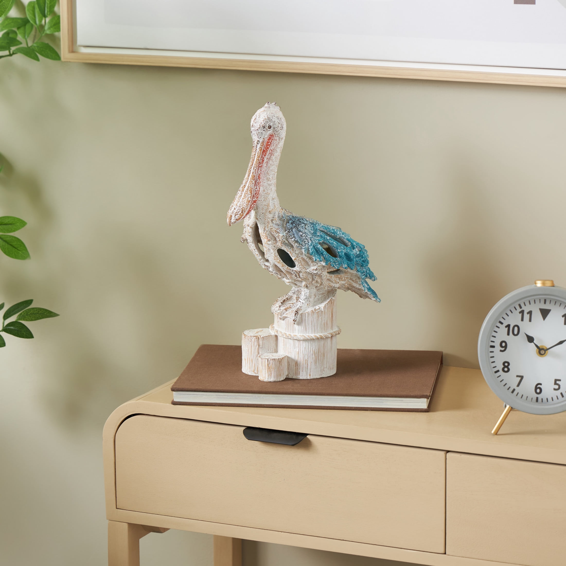 8" x 13" Blue Polystone Textured Pelican Sculpture with Blue Feathers, by DecMode