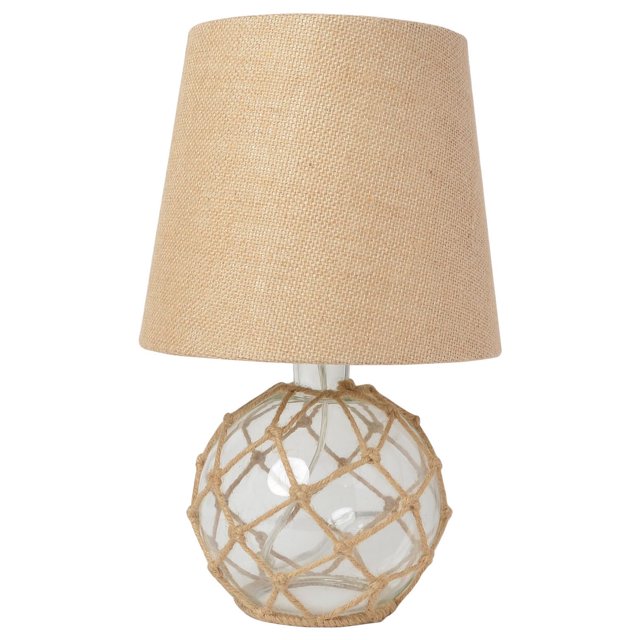 Coastal style table lamp featuring a burlap fabric shade and a clear sea glass base encased in buoy rope netting.