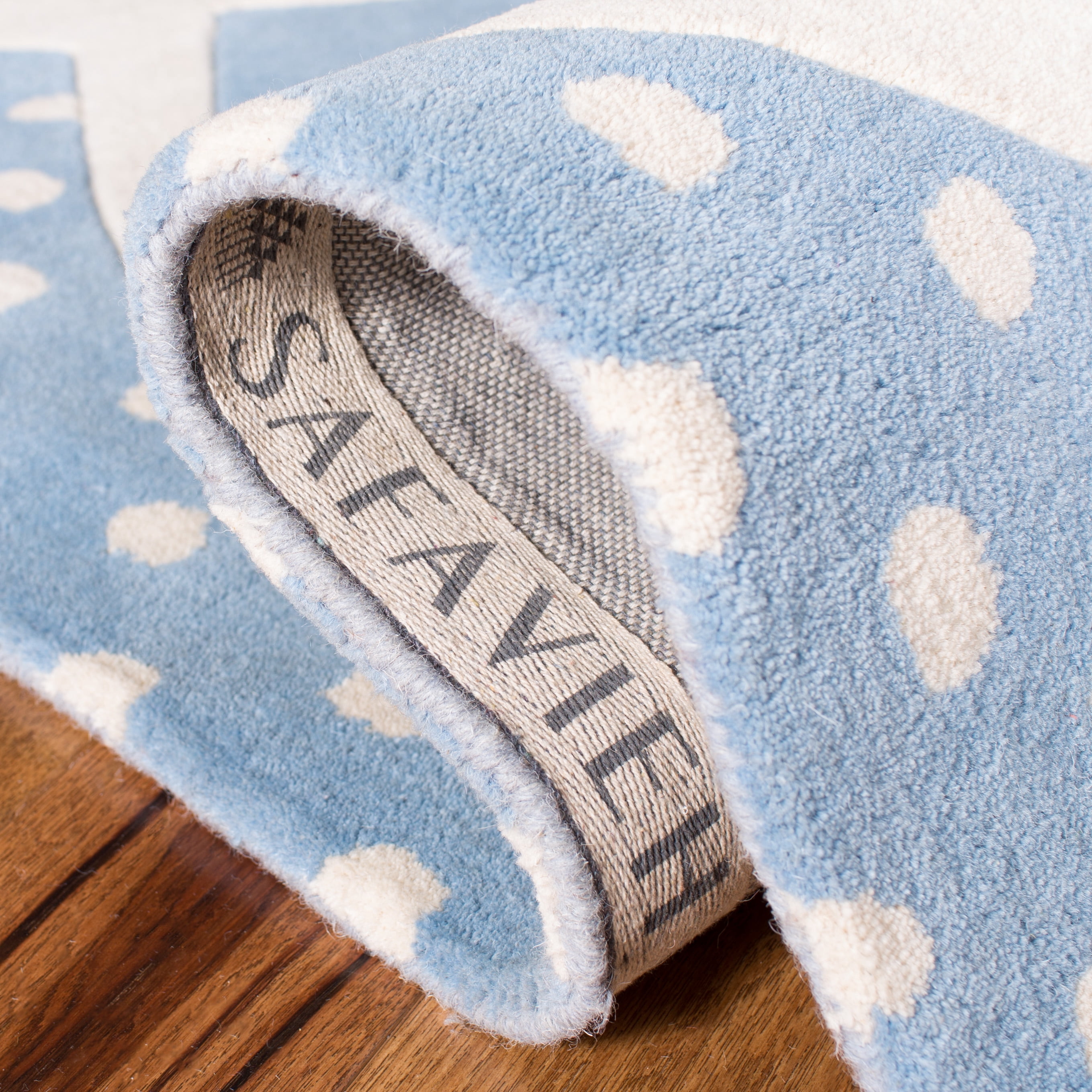 SAFAVIEH Kids Constantine Bunny Wool Area Rug, Blue/Ivory, 6' x 9'