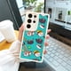 thumbnail image 3 of "Mejora el aspecto de tu iPhone15 Pro Max con esta moderna funda plateada mate de doble capa con estampado de dibujos animados para teléfono", 3 of 4