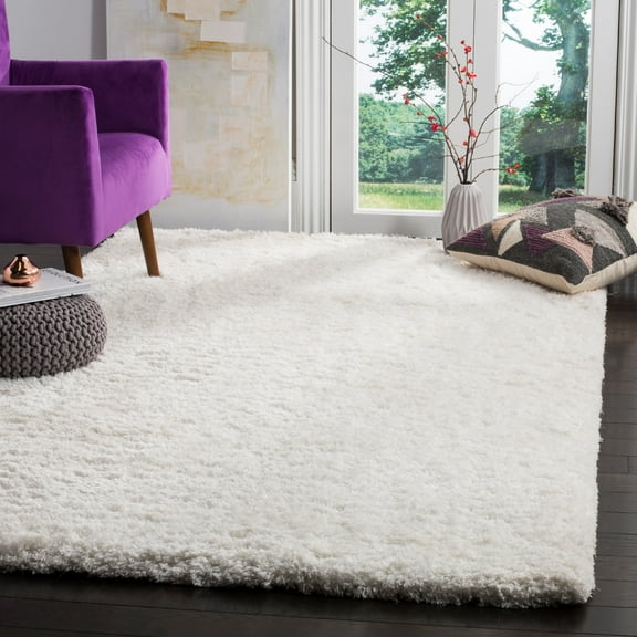 SAFAVIEH Florence Waverly Solid Polyester Shag Area Rug, White, 5' x 8'