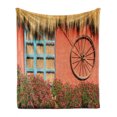 thumbnail image 1 of Barn Wood Wagon Wheel Soft Flannel Fleece Throw Blanket, Country House in Ecuador Red Wall Window Summer Flowers Straw Roof, Cozy Plush for Indoor and Outdoor Use, 70" x 90", Multicolor, by Ambesonne, 1 of 6