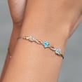 thumbnail image 4 of Gem Stone King 925 Silver and 10K Yellow Gold Peach Morganite Swiss Blue Topaz Sky Blue Aquamarine and Lab Grown Diamond Tennis Bracelet for Women By Keren Hanan (1.85 cttw, Adjustable up To 9 inch), 4 of 4