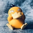thumbnail image 4 of Figuras de acción de Pokémon Psyduck Squirtle, juguetes Kawaii, modelo de dibujos animados, adorno de coche, estatua, decoración, regalo para niños, 4 of 4
