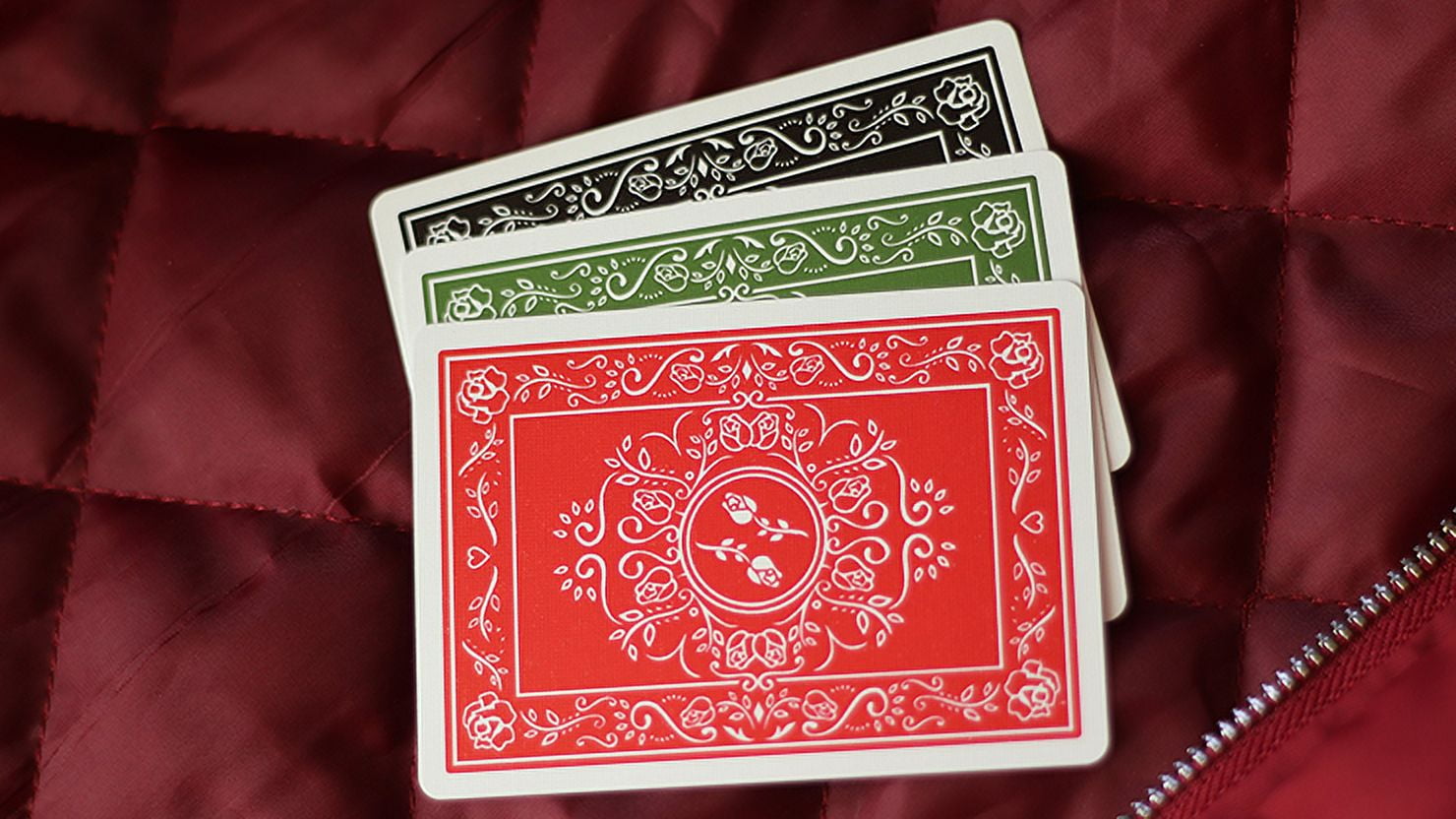 Red Roses Impossible Bottle Playing Cards by Daniel Schneider
