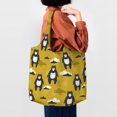 thumbnail image 4 of Xecao's Cartoon Bear Yellow Canvas Tote Bag is a versatile choice for women, serving as a stylish beach bag, shopping bag,and reusable grocery bag., 4 of 5