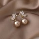thumbnail image 5 of EeaseMX 1 par de pendientes de aleación con estilo para mujer, pendientes de perla, joyas elegantes para los oídos., 5 of 8