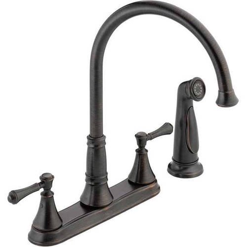 Delta Cassidy Two Handle Kitchen Faucet With Spray Champagne