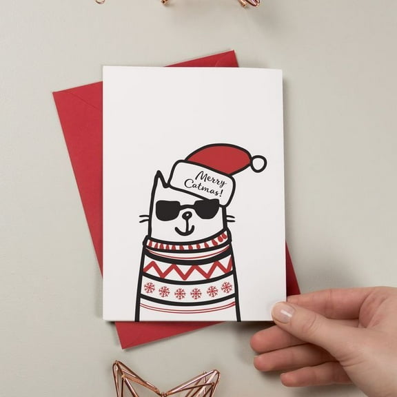 Merry Catmas! Greeting Card – Funny Holiday Card Featuring a Cool Cat in a Sweater and Santa Hat – Perfect for Christmas Wishes and Season’s Greetings