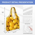 thumbnail image 2 of Xecao's Ripe Yellow Lemon Canvas Tote Bag is a versatile choice for women, serving as a stylish beach bag, shopping bag,and reusable grocery bag., 2 of 5
