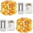 thumbnail image 1 of Juego de 2 guirnaldas de luces navideñas a pilas de 10 metros y 100 LED con control remoto y temporizador. Luces de luciérnaga con 8 modos de brillo para decoración de jardín, fiestas e interiores., 1 of 5