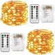 thumbnail image 1 of Juego de 2 guirnaldas de luces navideñas a pilas de 10 metros y 100 LED con control remoto y temporizador. Luces de luciérnaga con 8 modos de brillo para decoración de jardín, fiestas e interiores., 1 of 5