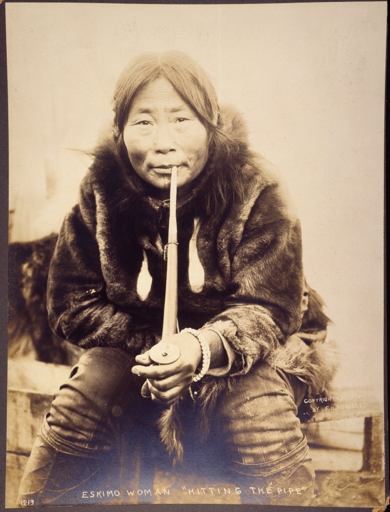 Alaska: Eskimo Woman, 1904. /Nan Eskimo Woman Smoking A Pipe ...