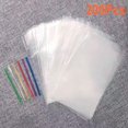 thumbnail image 1 of Cello Cellophane Treat Bags, 8 X 12 Inches Big OPP Clear Plastic Bags For Bakery, Popcorn, Cookies, Candies, Dessert with 6 Colors Twist Ties(100 Pieces Bags + 100 Pieces Twist Ties) (100, 8 X 12), 1 of 8