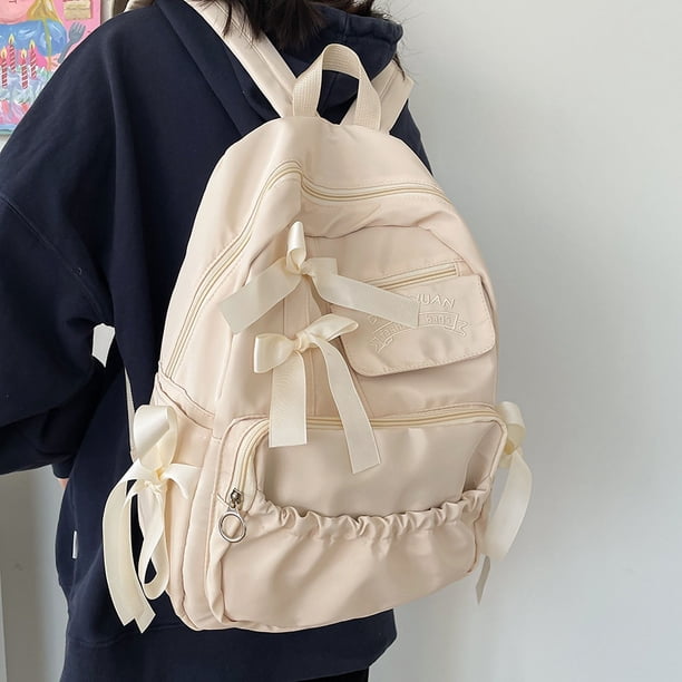 Mochila escolar con lazo plisado y personalidad de contraste de colores bonitos con estilo de animación para chicas y estudiantes