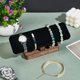 thumbnail image 4 of Exhibidor de relojes de madera de 19,8 x 6 x 8,5 cm. Exhibidor de pulseras de terciopelo negro con base de madera. Organizador rectangular de pulseras. Torre de exhibición de relojes., 4 of 9