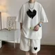 thumbnail image 3 of Traje de moda coreana para hombre, con estampado de gofres, camiseta de manga corta y pantalones cortos, conjuntos de ropa deportiva para hombre, chándal para correr, conjunto de 2 piezas, trajes esta, 3 of 5