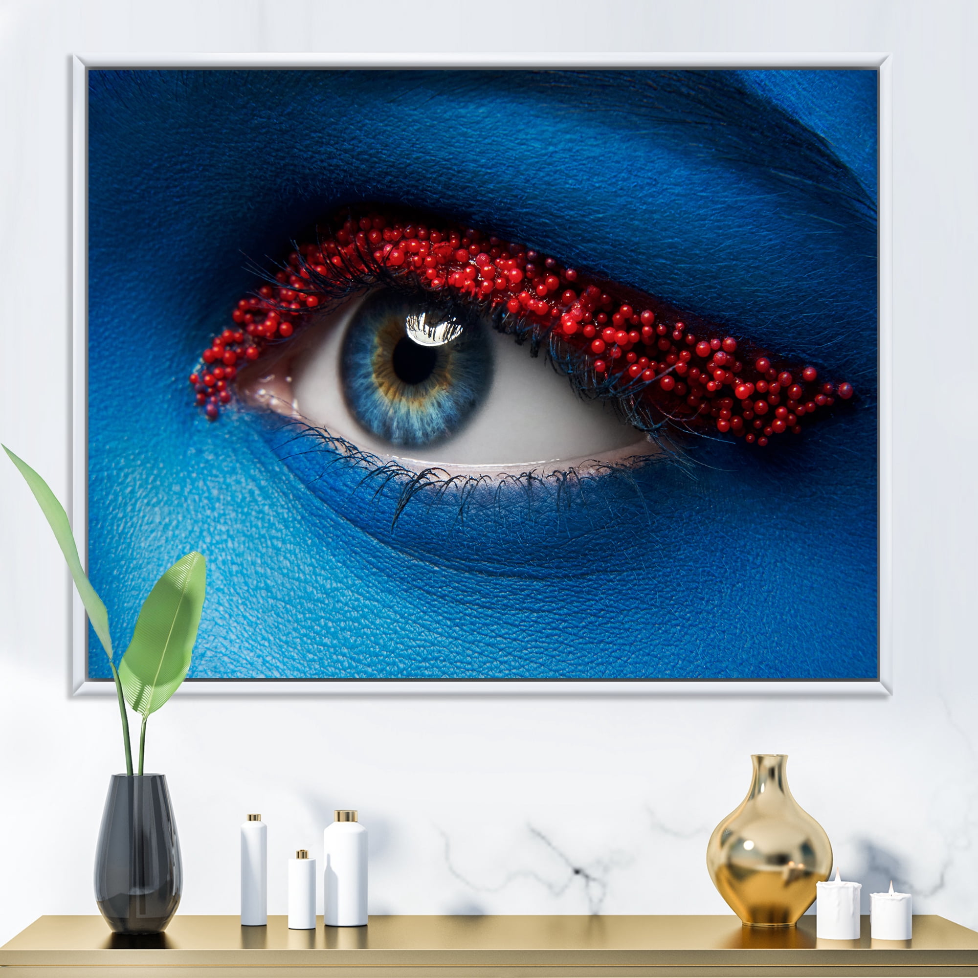 Designart 'Woman Eye With Blue Paint On Face & Red Balls' Modern Framed Canvas Wall Art Print