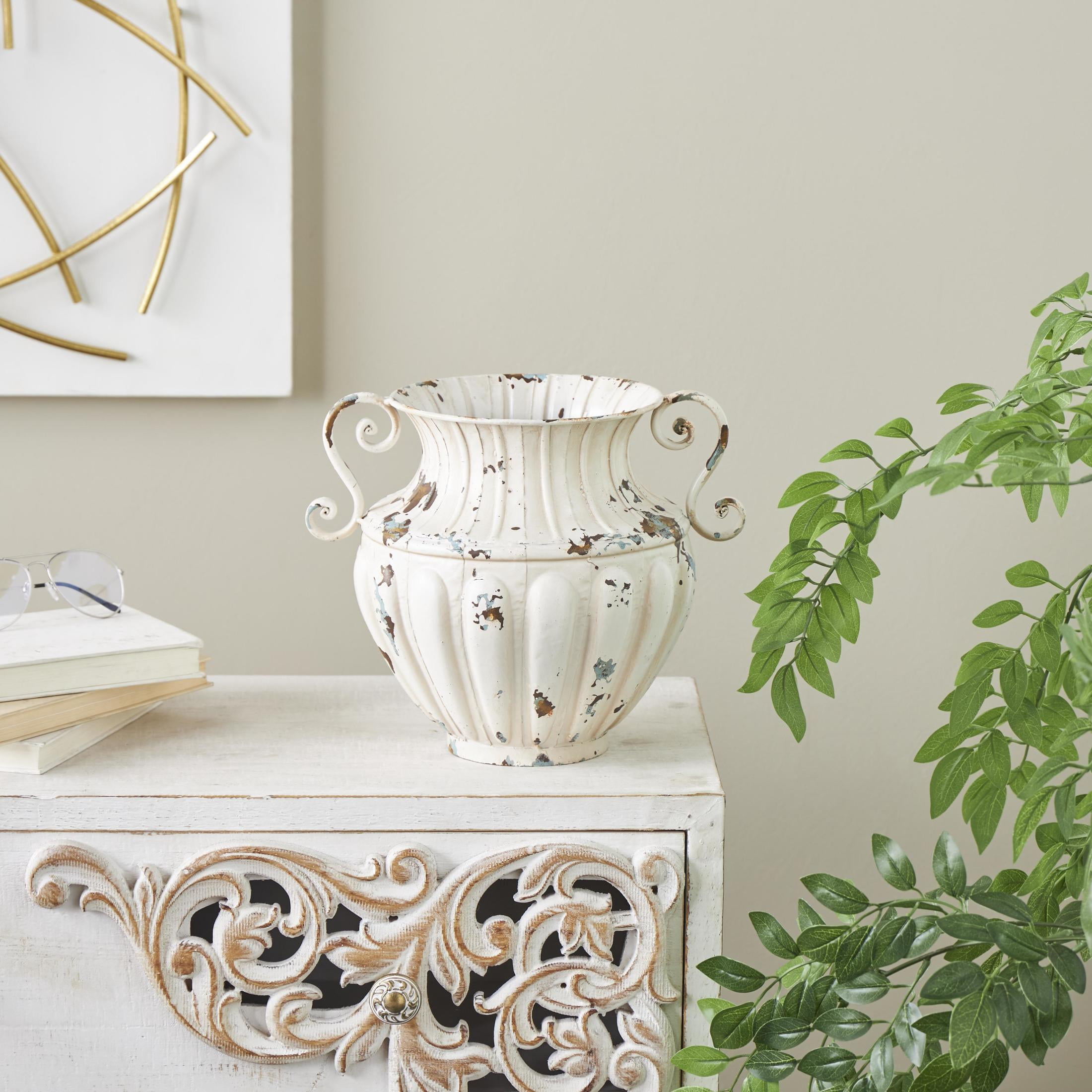 DecMode 10" Scroll Vintage Amphora Cream Metal Vase with Brown and Teal Distressing and Scroll Handles