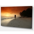 thumbnail image 2 of Woman Walking on Beach, 2 of 3