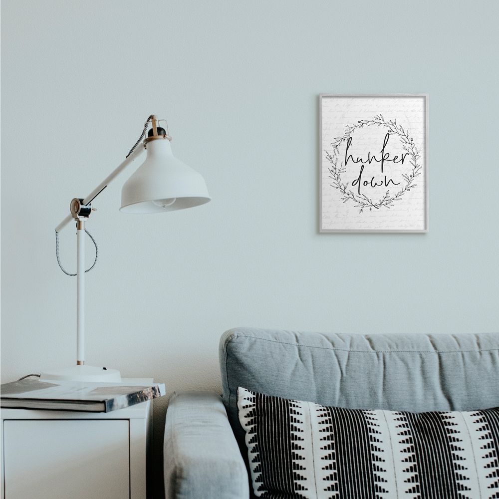 Stupell Industries Hunker Down Phrase Spring Wreath Design Black White Framed Wall Art Design by Lettered and Lined, 11" x 14", Gray Framed