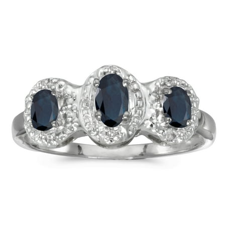 - 10k White Gold Oval Sapphire And Diamond Three Stone Ring