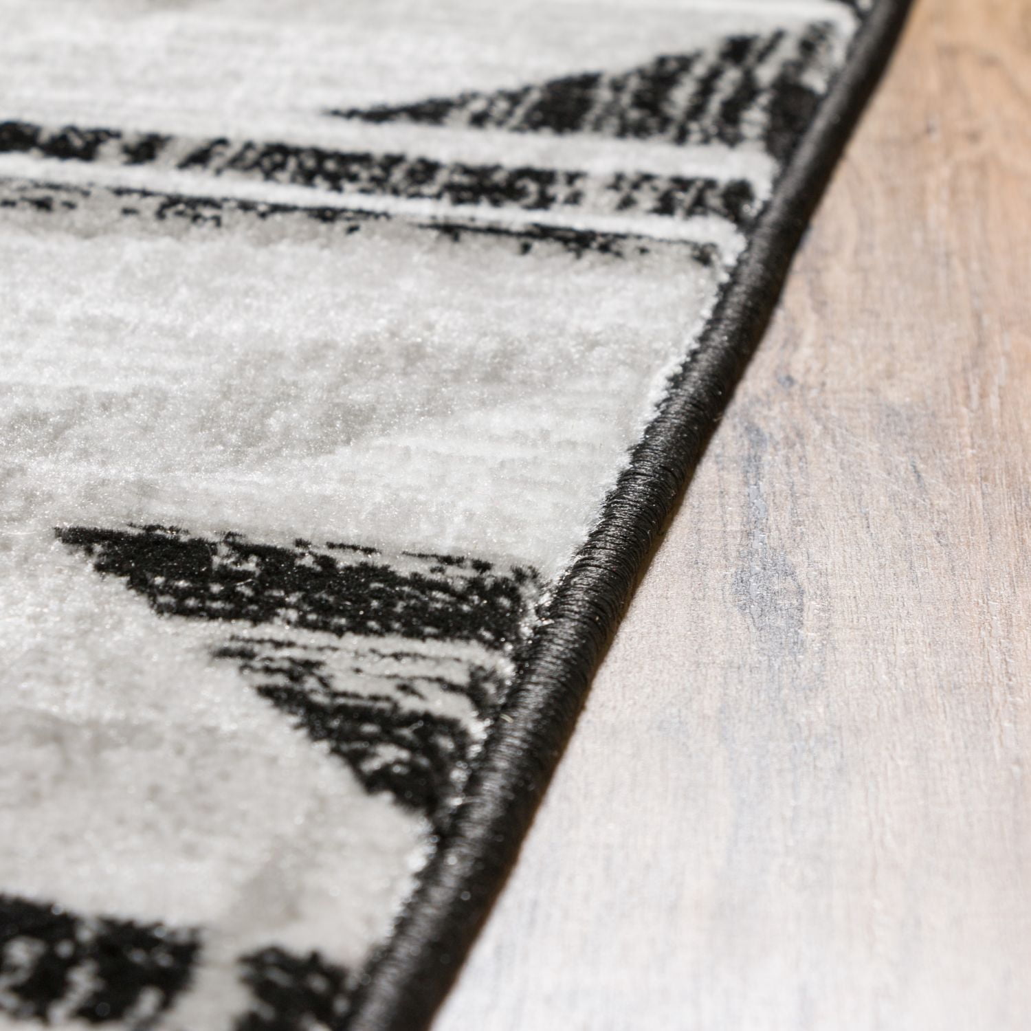 Well Woven Ash Isla Modern Black Area Rug