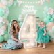 thumbnail image 1 of Marquee Light Up Numbers Teebloom de 3 pies con bolsa de agua pesada, 1 of 6