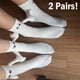 thumbnail image 2 of Calcetines magnéticos con manos para hombre y mujer, medias de tubo medio con ojos de dibujos animados divertidos, color blanco y negro, para regalo, 2 pares, 2 of 4