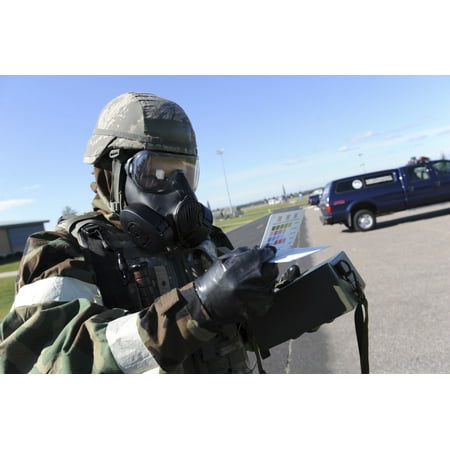 Chemical Soldier September 13 2011 - Soldier uses an M256 Kit to identify a simulated chemical type that was used during a chemical attack at Volk Field Wisconsin Poster Print ()