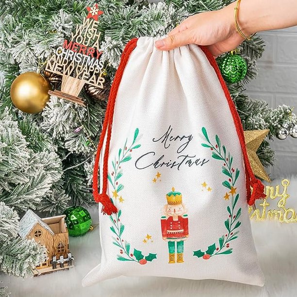 Sacos vendedores calientes de la Navidad del Cascanueces del cordón de la tela de algodón de 11,8 x 16,9 pulgadas para la decoración de los regalos de Navidad