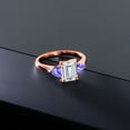 thumbnail image 4 of Gem Stone King 18K Rose Gold Plated Silver White Moissanite and Blue Tanzanite 3-Stone Ring for Women (2.09 Cttw, 8X6MM Emerald Cut and 3.5 Trillion, Gemstone Birthstone, Size 7), 4 of 4