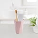 thumbnail image 5 of Plastic Mouthwash Mug | Travel Brushing Cup | Ergonomic Non-Slip Handle | Compact Rinse Cup | Rounded Edge Design | Portable Toothpaste Cup | 9.6x7x5.7cm | 1 Piece | Pink Blue Green Yellow, 5 of 6