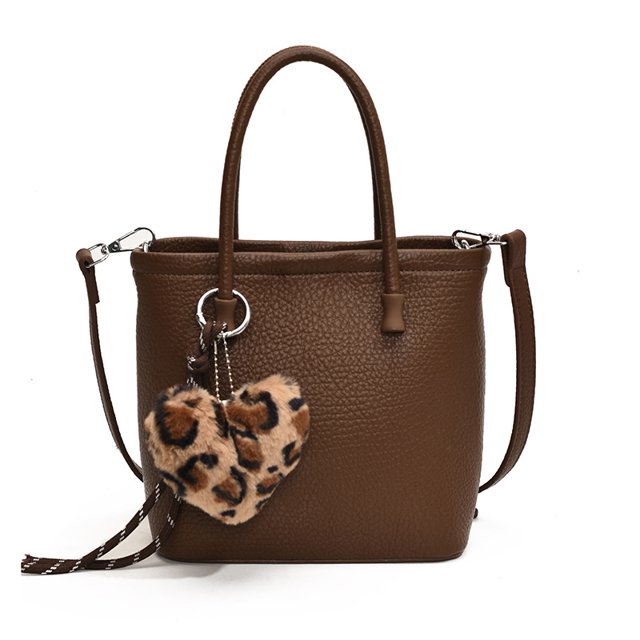 Bolso de hombro popular de este año, bolso de axila versátil retro para mujer, nuevo bolso de mensajero 2025, bolso de cubo portátil para viajeros