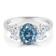 thumbnail image 2 of Gem Stone King 10K White Gold Persian Blue Moissanite White Moissanite and White Diamond Oval 3-Stone Engagement Ring for Women (2.38 Cttw, Gemstone, Size 5), 2 of 3