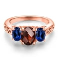 thumbnail image 3 of Gem Stone King 18K Rose Gold Plated Silver Red Garnet and Blue Created Sapphire Filigree Style 3 Stone Ring for Women (2.73 Cttw, Oval 8X6MM and 6X4MM) (Size 6), 3 of 6
