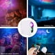 thumbnail image 2 of Proyector de cielo estrellado 4 en 1, lámpara de proyección de nebulosa y luna con rotación de 360°, control remoto RF y altavoz Bluetooth, luz nocturna LED para decoración, regalo de Navidad [Clase], 2 of 5