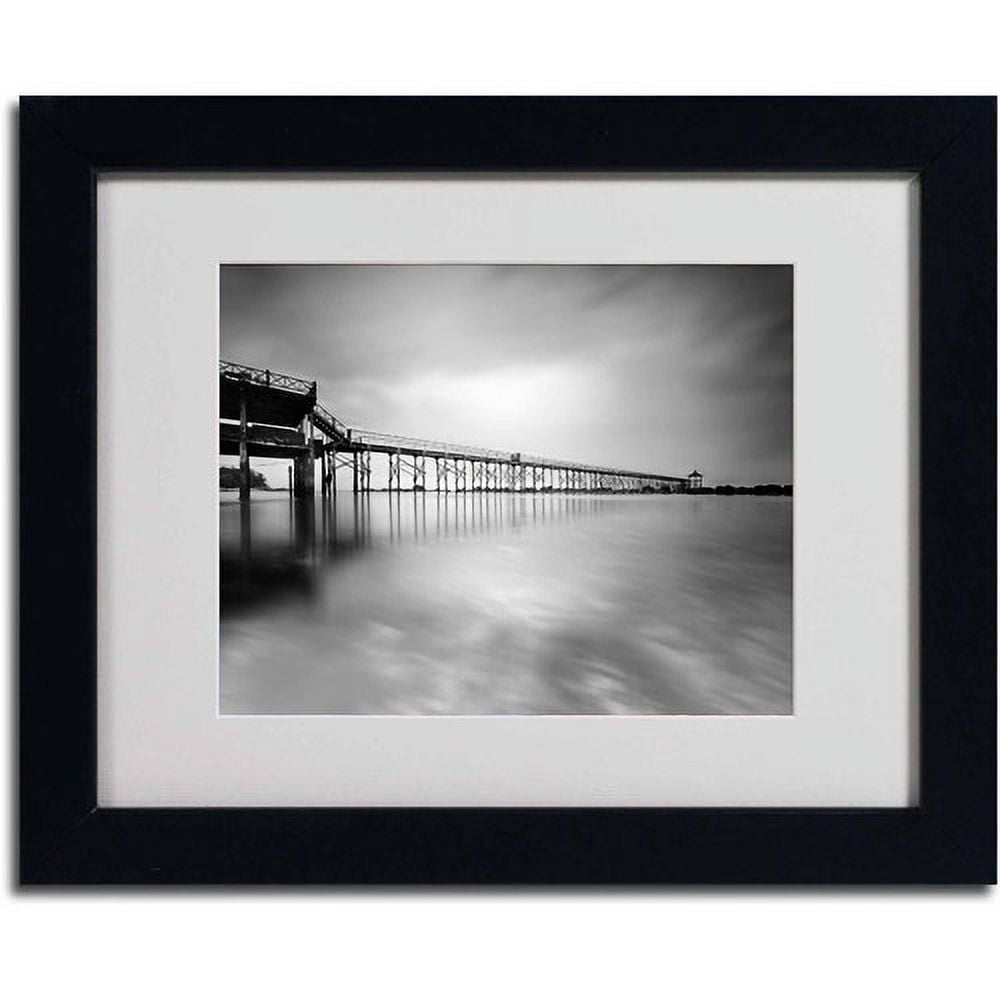 Matted art under acrylic in a black frame