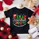 thumbnail image 5 of Feliz Navidad 2024 con amor y paz con camisetas estampadas familiares Conjunto familiar a juego Camiseta para mamá, papá, niños, mameluco para bebé, 5 of 5