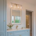 thumbnail image 4 of LaLuz Carson Carrington Modern 2/3/4-Light Gold Bathroom Vanity Lights Glass Wall Sconces Clear 29"L-4-Light Brass,Gold Painted,Polished,Brushed 25 to, 4 of 5