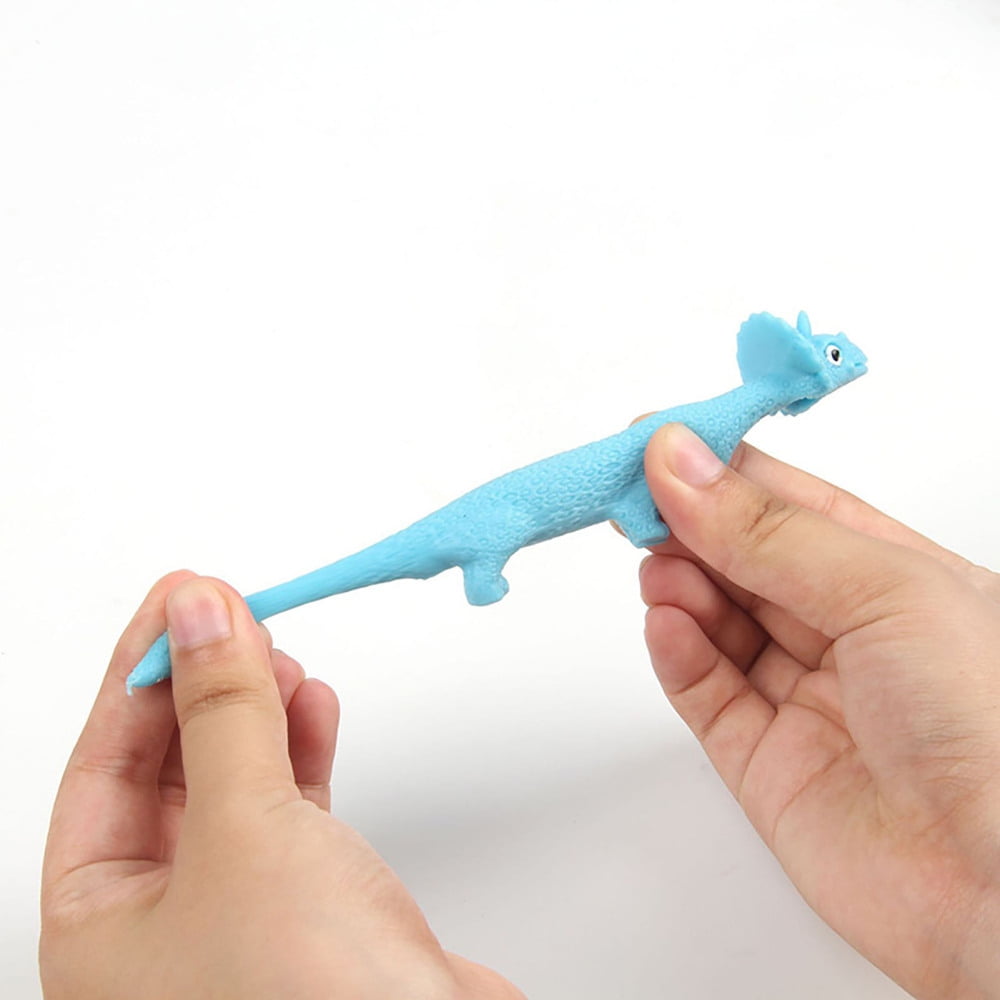 Creative Finger Ejection Dinosaur Decompression Toys For Children And Boys  With Slingshot Targeting Dinosaur Soft Rubber Trick Release Sticky Wall Toy
