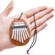 thumbnail image 4 of Mini piano de pulgar Kalimba de 8 teclas, regalo para niños principiantes, exquisito adorno de piano de dedo para árbol de Navidad (ovalado), 4 of 4