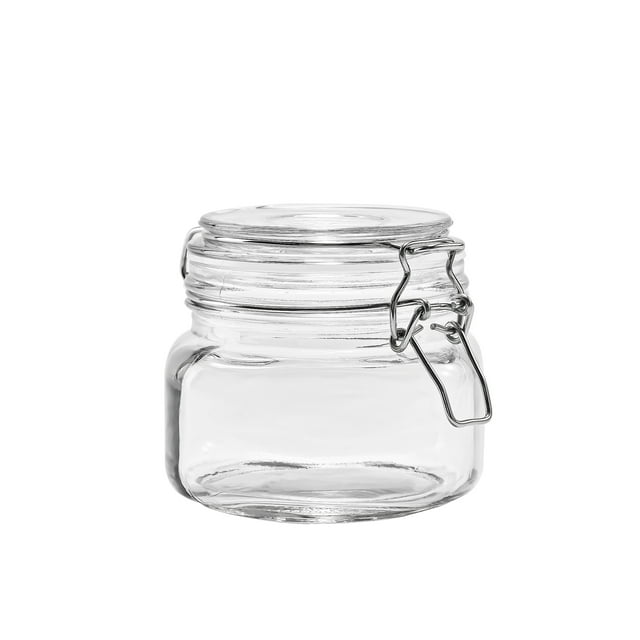 Clear 17-ounce glass storage jar with metal locking lid for airtight sealing.