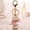Pink, variant on New Exquisite Pearl String Carousel Key Chain Girls Bag Car Strap