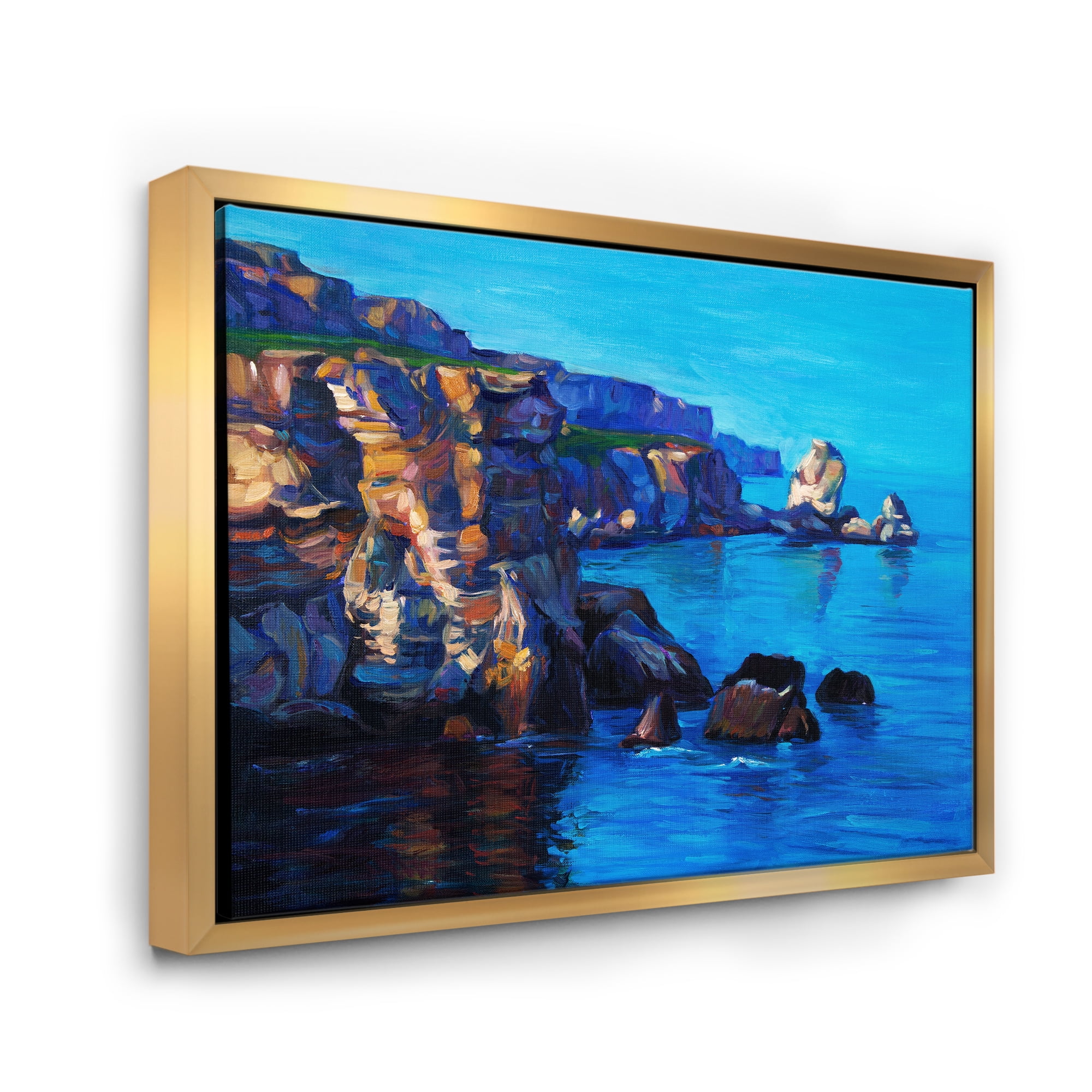 The Ocean By Cliffs In The Evening Glow 32 in x 24 in Framed Painting Canvas Art Print, by Designart