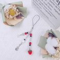 thumbnail image 2 of Lindos amuletos para teléfono, amuletos estéticos para celular, correa con forma de mariposa y fresa, 2 of 5