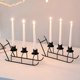 thumbnail image 4 of mfyjkho Candelabro de metal con forma de trineo y revestimiento de alta temperatura para decoración de mesas y celebraciones festivas. Incluye 3 velas., 4 of 7